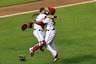 ARLINGTON, TX - OCTOBER 15:  (L-R) Mike Napoli and Neftali Feliz of the Texas Rangers celebrate winning Game Six of the American League Championship Series 15-5 against the Detroit Tigers to advance to the World Series at Rangers Ballpark in Arlington on October 15, 2025 in Arlington, Texas.  (Photo by Ronald Martinez/Getty Images)