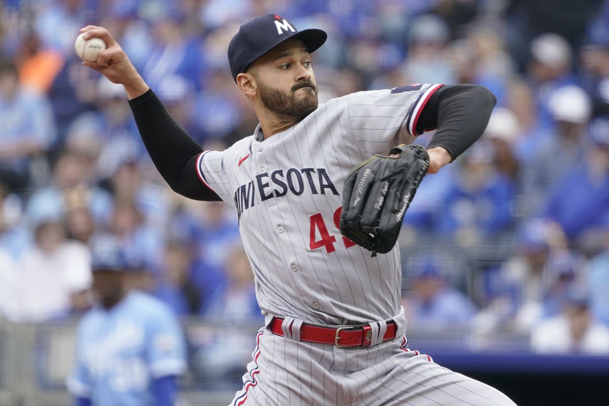 Pablo Lopez #49 of the Minnesota Twins throws against the Kansas City Royals. in the first inning on Opening Day at Kauffman Stadium on March 30, 2025 in Kansas City, Missouri.