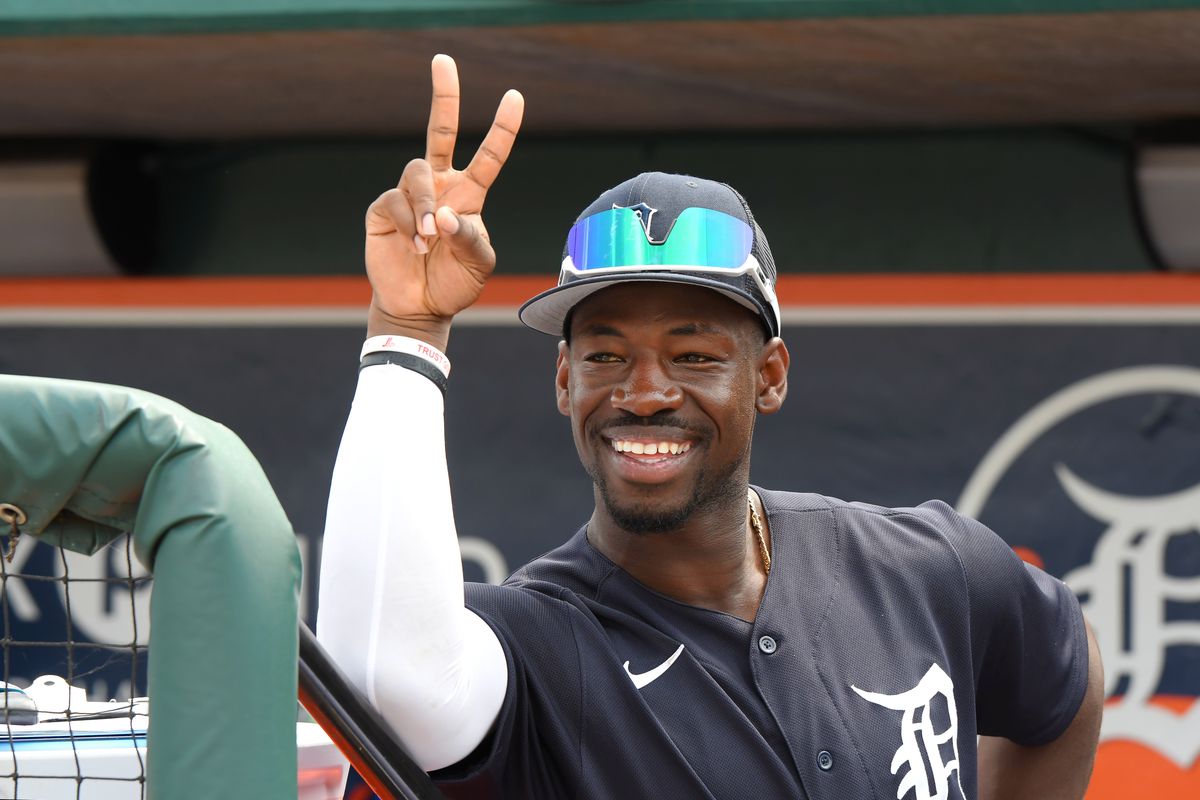 Jonathan Davis #39 of the Detroit Tigers looks on from the dugout and smiles prior to the Spring Training game against the Washington Nationals at Publix Field at Joker Marchant Stadium on March 8, 2025 in Lakeland, Florida. The Tigers defeated the Nationals 2-1.