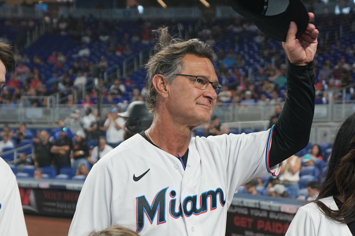 Miami Marlins manager Don Mattingly (8) tips his cap to the fans during a ceremony with his family in the fifth inning at loanDepot Park. Mattingly said he would not return next season.&nbsp;