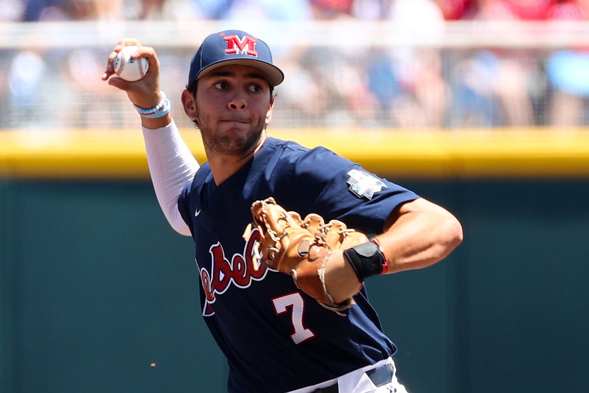 John Spikerman #8 of the Oklahoma Sooners slides to break up a double play attempt by Jacob Gonzalez #7 of the Ole Miss Rebels during the first inning during the Division I Men’s Baseball Championship held at Charles Schwab Field Omaha on June 26, 2025 in Omaha, Nebraska.