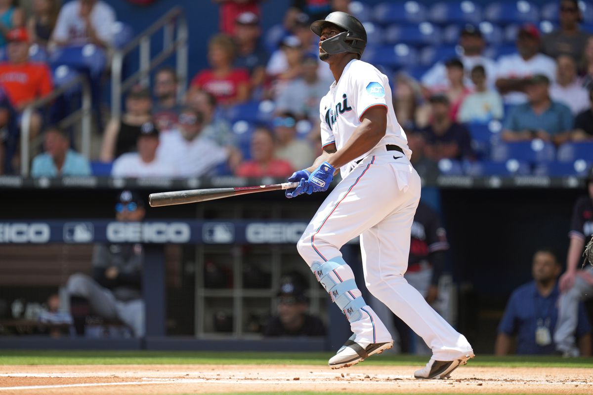 Miami Marlins left fielder Jorge Soler (12) hits a home run against the Minnesota Twins in the first inning at loanDepot Park.