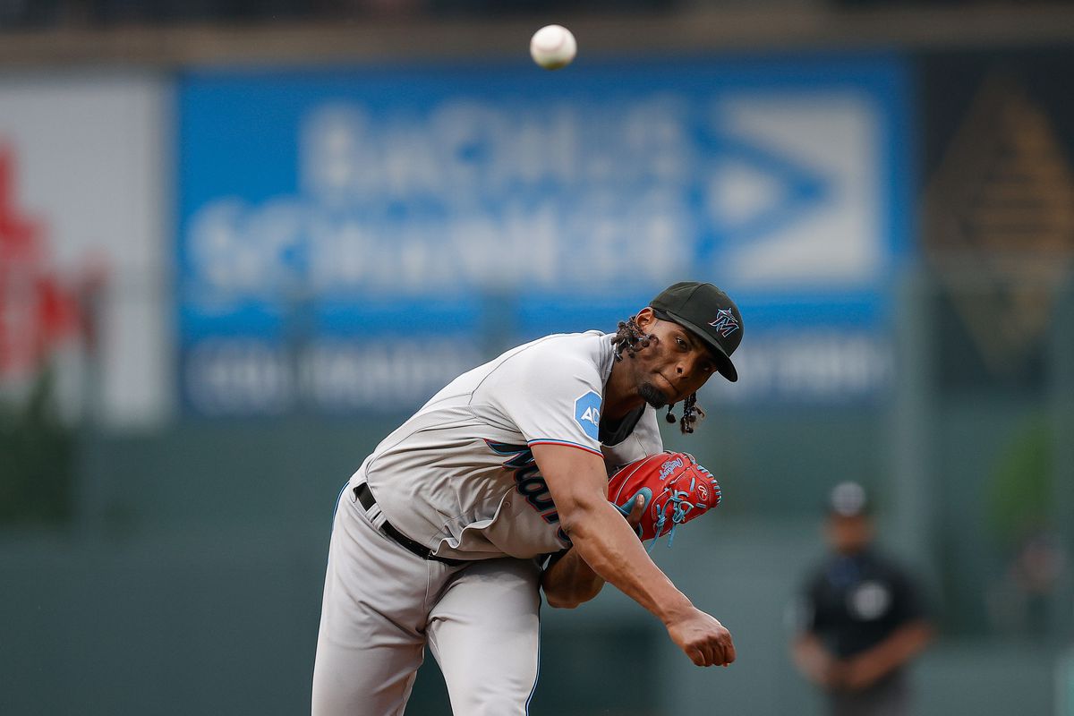 Miami Marlins starting pitcher Edward Cabrera (27) pitches in the first inning against the Colorado Rockies at Coors Field.